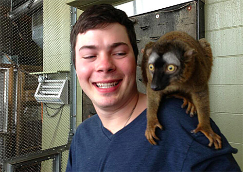 Mike hanging with a bewildered lemur. 