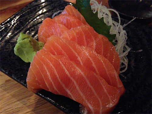 Salmon sashimi (6 pc) - $9.95
