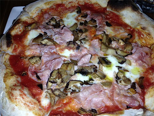 Prosciutto Cotto - San Marzano tomato sauce, mozzarella fior di latte, italian ham, roasted wild mushrooms - $16