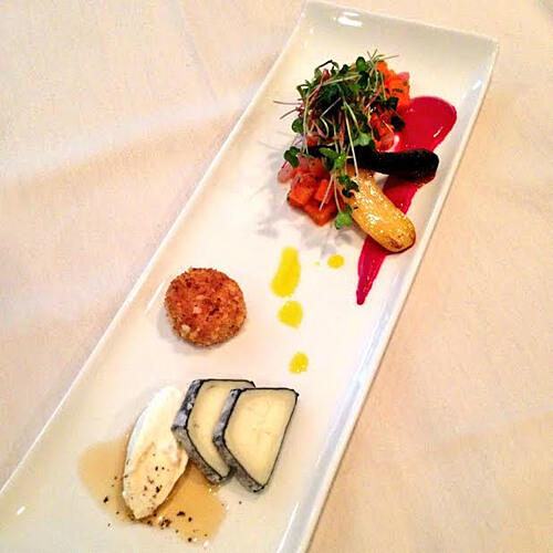 Canadian goat cheese, roasted and pickled carrots, beets (Bull's Blood) gerhbs and horseradish emulson.